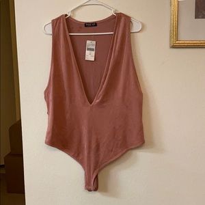 Pink bodysuit